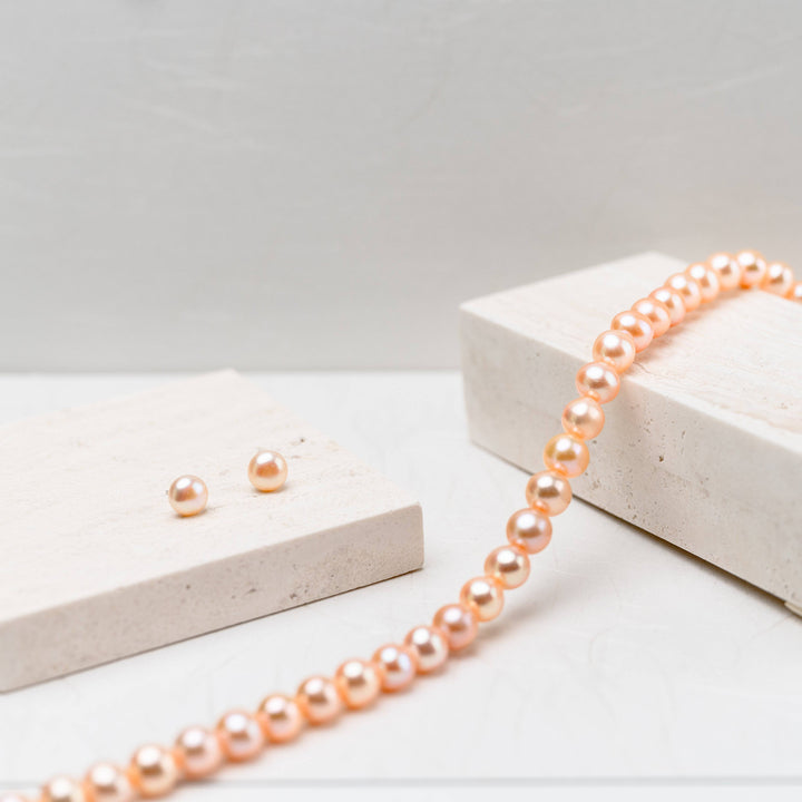 Elegant Freshwater Pink Semi Round Pearl Stud Earrings WE00208 - PEARLY LUSTRE