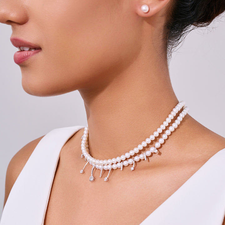 أقراط مسمارية من اللؤلؤ المائي العذب من الدرجة الأولى بذهب عيار 18 قيراط KE00023