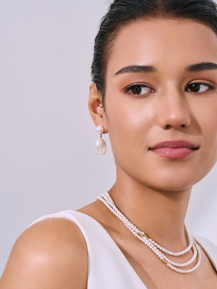 Orecchini in perla barocca elegante in oro 18K KE00252