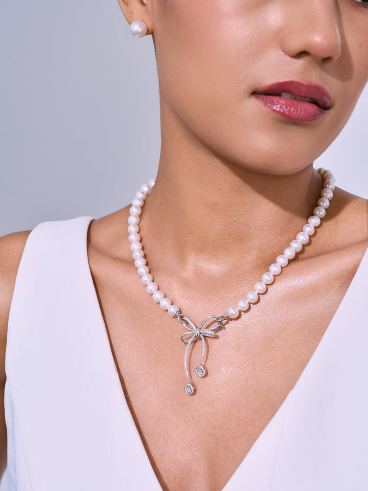 Collier et broche de perles d&