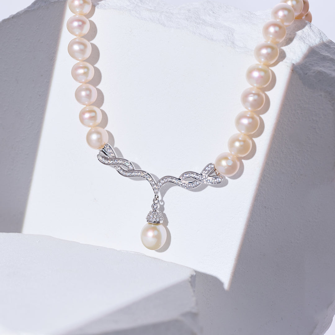 Halskette mit Süßwasserperlen aus 18-karätigem Gold KN00021