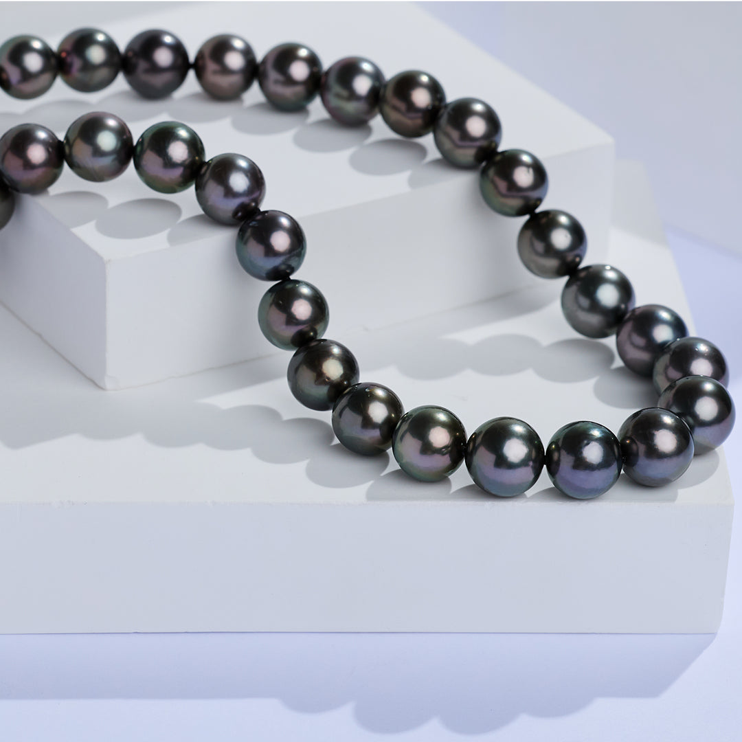 Collier en or massif 18 carats PEACOCK avec perle tahitienne KN00394