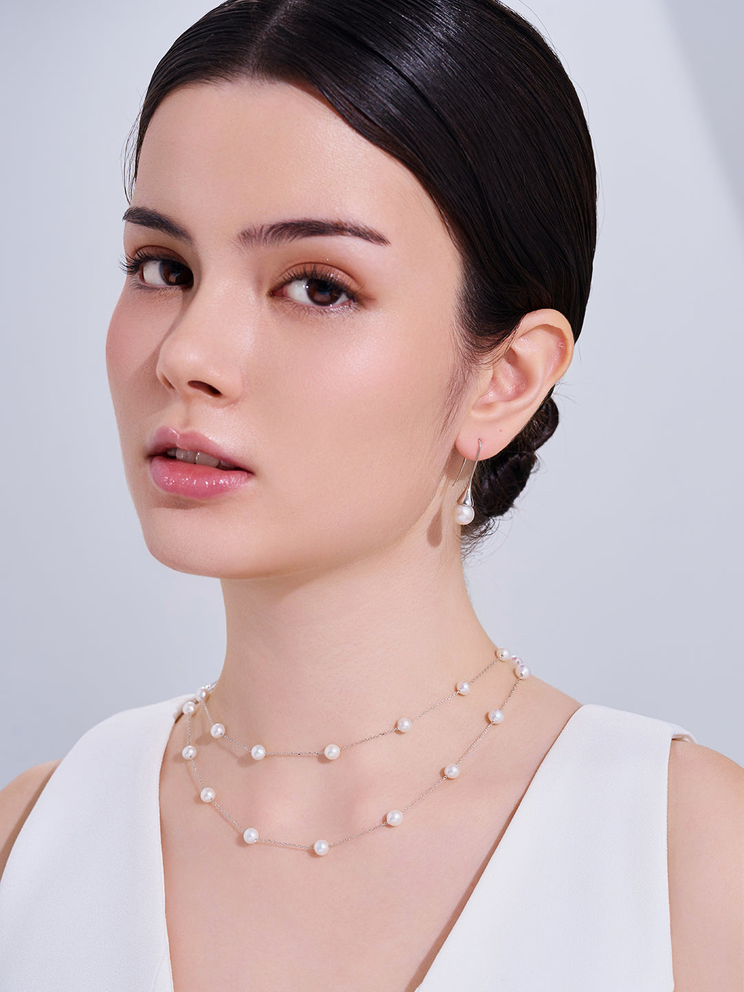 Boucles d'oreilles élégantes en perles d'eau douce WE00033