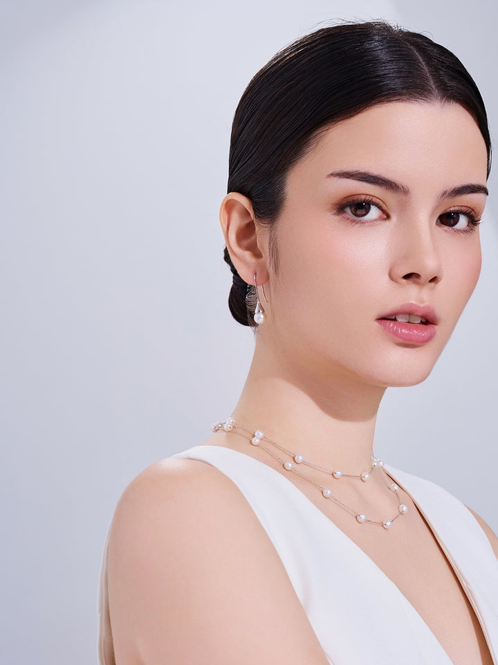 Boucles d'oreilles élégantes en perles d'eau douce WE00033