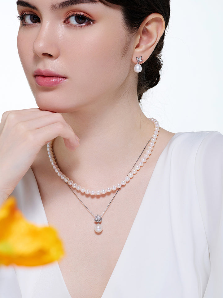 Pendientes elegantes de perlas de agua dulce WE00055