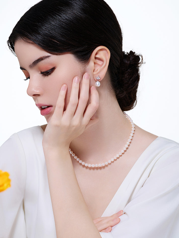 Pendientes elegantes de perlas de agua dulce WE00055