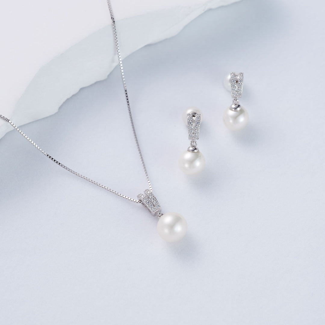 Elegantes aretes de perlas de agua dulce WE00061