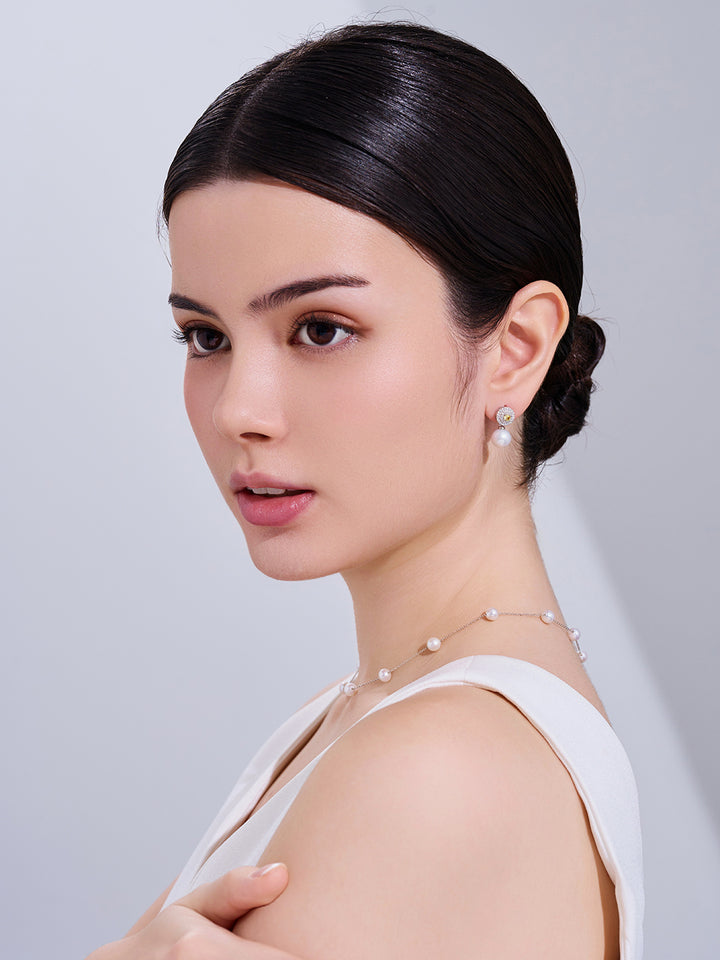 Pendientes elegantes de perlas de agua dulce WE00348