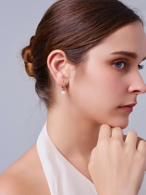 Boucles d'oreilles élégantes en perles d'eau douce WE00981