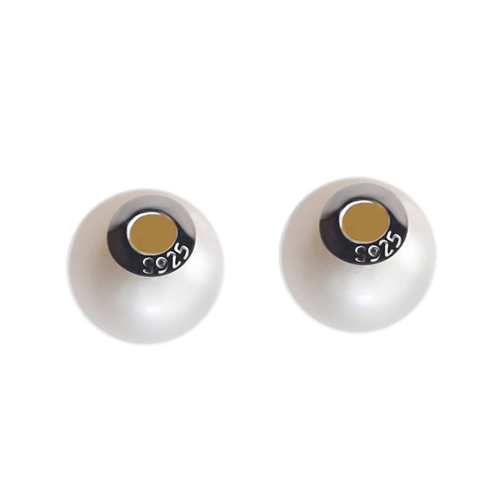 Elegantes aretes de perlas de agua dulce WE00545
