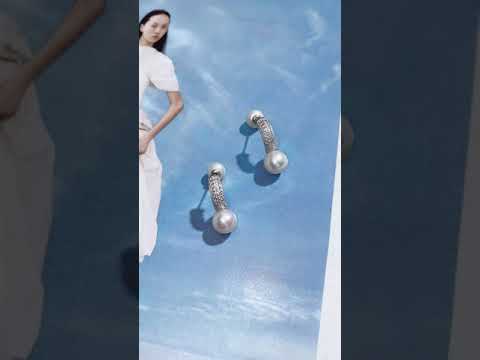 Elegantes aretes de perlas de agua dulce WE00622