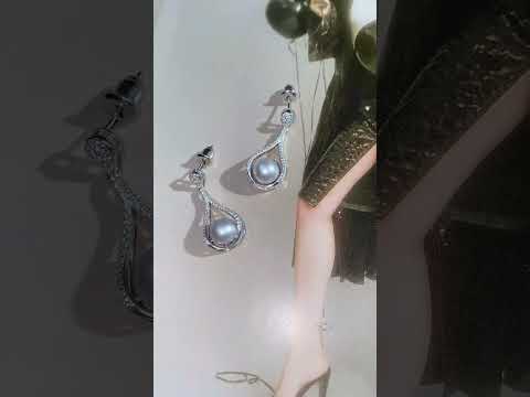 Elegantes aretes de perlas de agua dulce WE00639