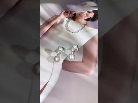 Elegantes aretes de perlas de agua dulce WE00596