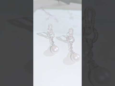 Elegantes aretes de perlas de agua dulce WE00613