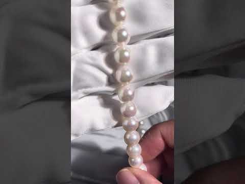Collana di perle Akoya barocche in oro 18 carati KN00181