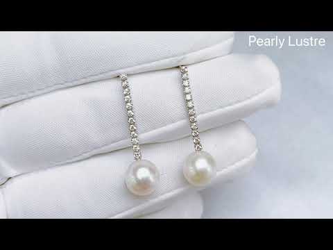 Elegantes aretes de perlas de agua dulce WE00298
