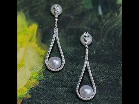 Elegantes aretes de perlas de agua dulce WE00347