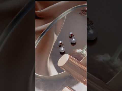 Elegantes aretes de perlas redondas de agua dulce WE00541