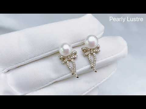 Elegantes aretes de perlas de agua dulce WE00297