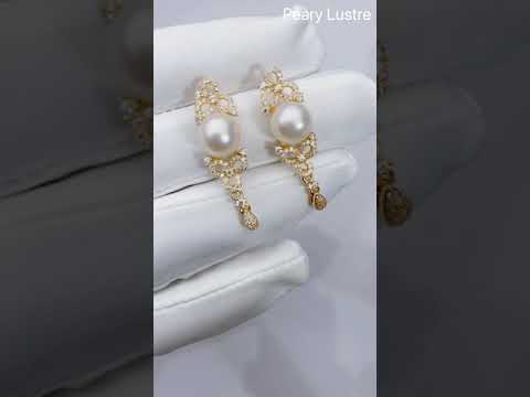 Elegantes aretes de perlas de agua dulce WE00262