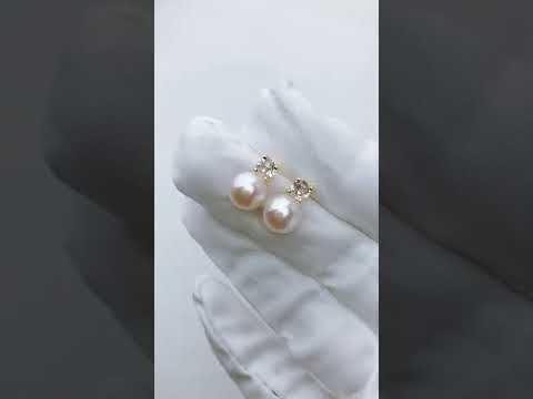 Boucles d'oreilles élégantes en perles d'eau douce semi-rondes WE00363