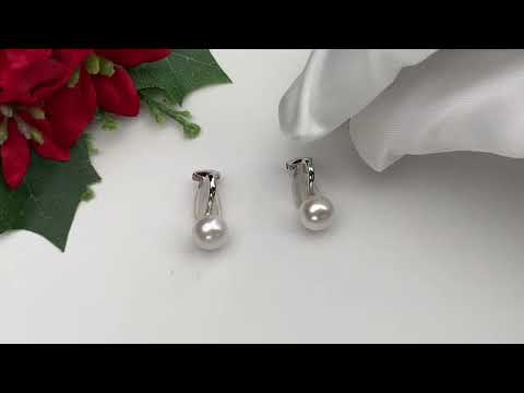 Elegantes aretes de clip con perlas de agua dulce WE00497