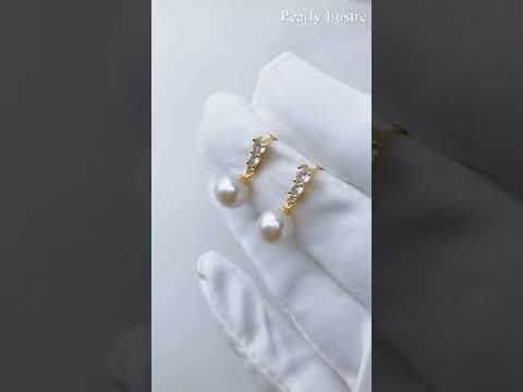 Pendientes elegantes de perlas de agua dulce WE00443