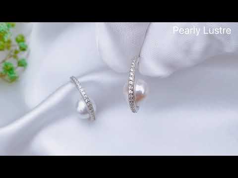 Elegantes aretes de perlas de agua dulce WE00184