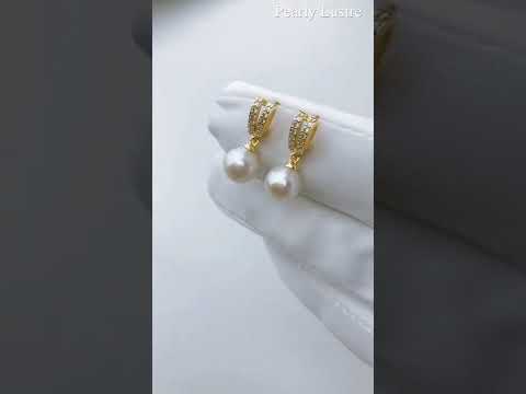 Pendientes elegantes de perlas de agua dulce WE00383