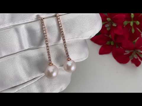 Elegantes aretes de perlas de agua dulce WE00510
